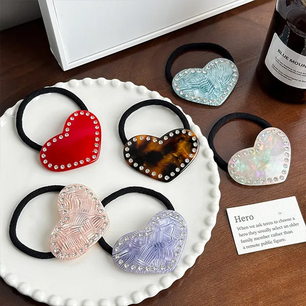 Custom heart rhinestone acetate hair tie manufactured by Dowell